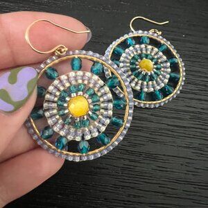 Miguel Ases earrings - turquoise teal blue gold wheel